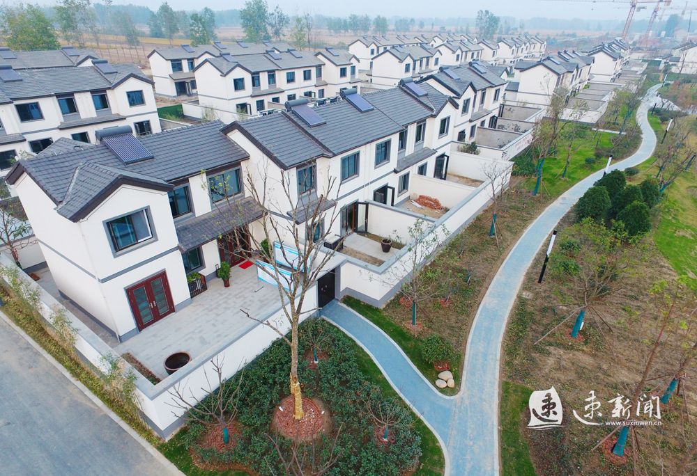 "春意盎然看新居"系列报道②松张口:所有群众住有所居住有优居
