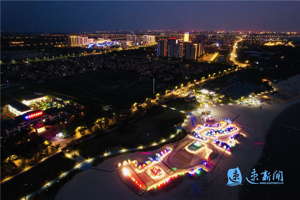 图说璀璨灯火里的骆马湖沙滩公园